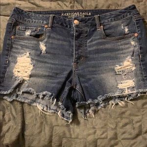 Distressed tomgirl midi denim shorts